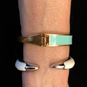 Two Vince Camuto designed bracelets.